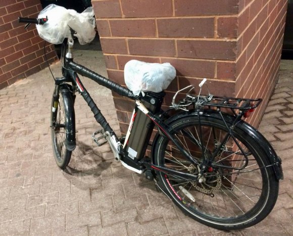 Roosevelt Island's got a bicycle problem Electric bike, illegal but ignored by PSD, stopped for a deliver in Manhattan Park after buzzing by me on the sidewalk.